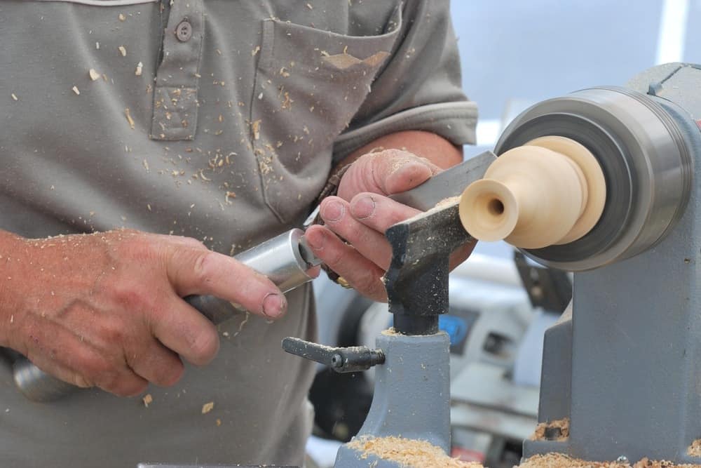 working at small wood lathe