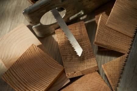 jigsaw blade on top of wooden blocks