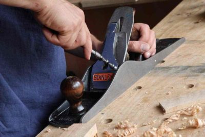 Man fixing the wood tool
